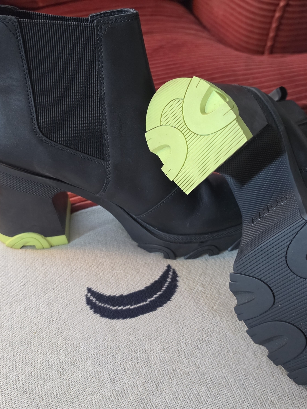 Sorel Black Ankle Chelsea Boots with Neon Green Sole Accents